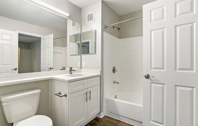 Model bathroom with white vanity at Hunters Green in Tampa, Florida.
