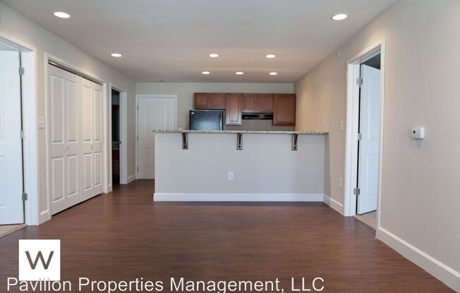 Large Apartments with Walk-In Closets, Granite Counter Tops, Washer and Dryer In Unit & Wood Floors