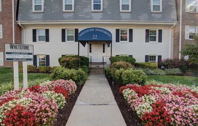 Entrance to leasing office and landscape