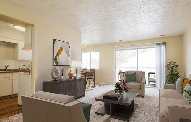 Living space with lots of natural light at georgetowne Apartments