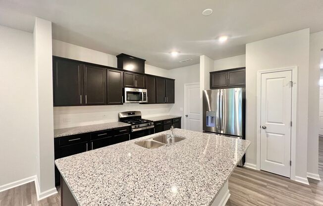 Newly Built 3BD, 2.5BA Raleigh Townhome in an HOA Community with Amenities