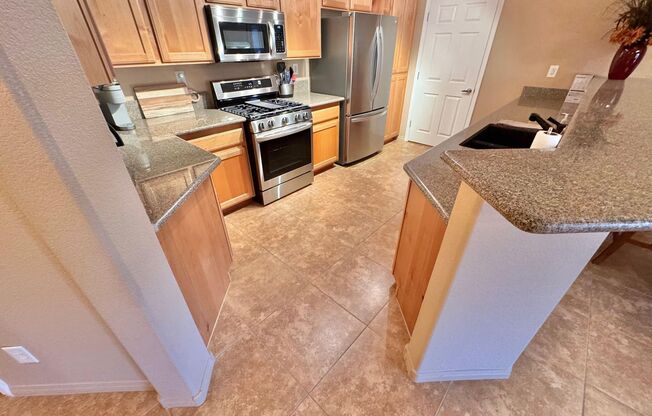 DISCOVER CONTEMPORARY LIVING IN THIS STYLISH TOP-FLOOR 2-BEDROOM, 2-BATHROOM CONDO LOCATED IN THE HIGHLY DESIRABLE SOUTHWEST LAS VEGAS AREA.