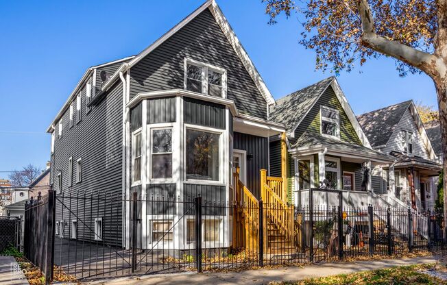 Spacious and Stunning Logan Square Duplex with 5 Bedrooms Plus