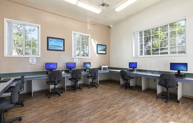 a large room with tables and chairs in it
