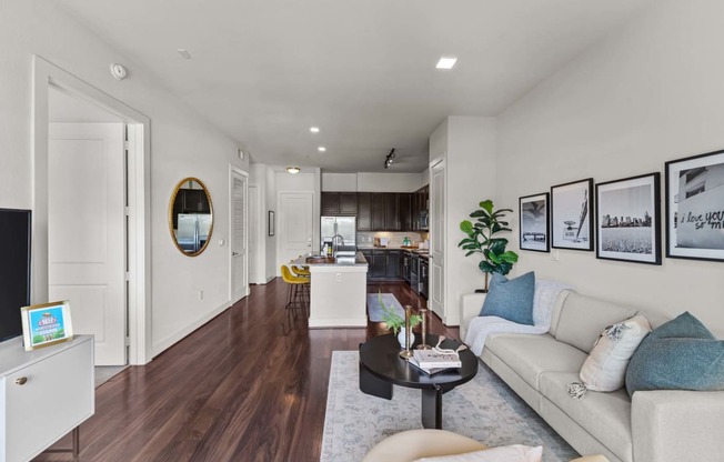 a living room with a couch and a table