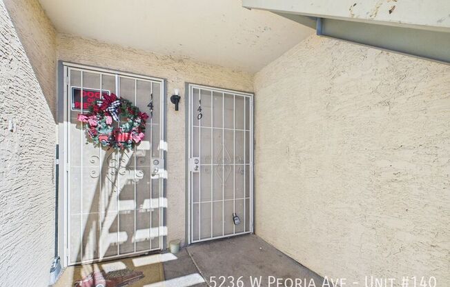 5236 W PEORIA AVE