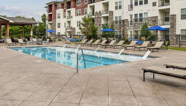 our apartments have a resort style pool with lounge chairs