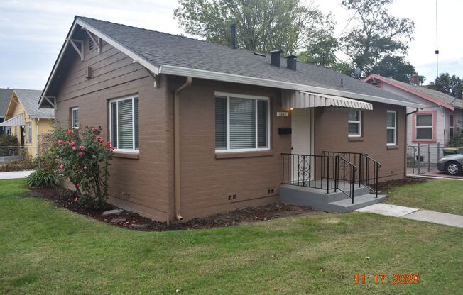 Darling Two Bedroom Home with all New Carpet/ Paint/ Dual Pane Windows/ Garage