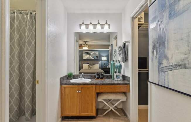 bathroom with designer lighting at The Berkshires at Vinings apartments