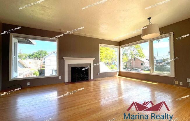 Ample Natural Light Large Rooms and Backyard