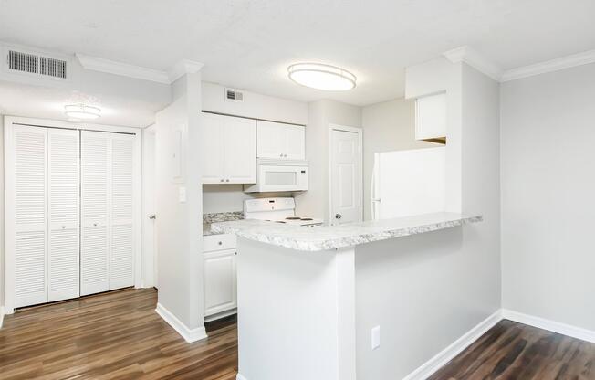 a kitchen with a sink and a window