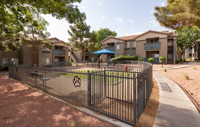 our apartments have a fenced in yard with a basketball court