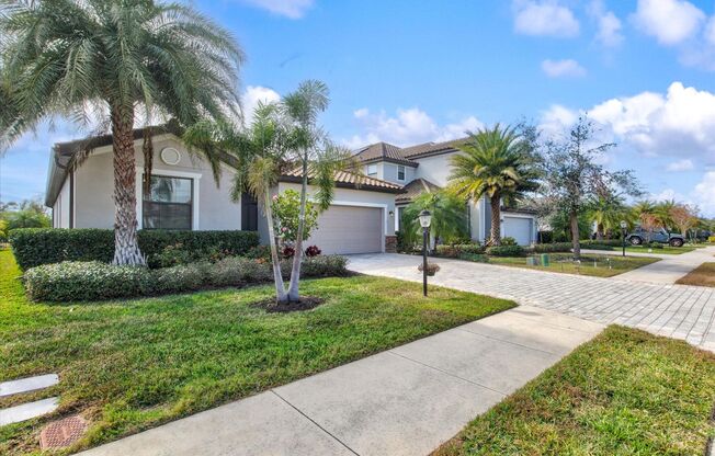 4 Bedroom 3 Bathroom Pool Home with a Pond View in a Gated Community