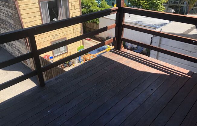 PRICE REDUCED - Remodeled top floor rent controlled apartment w/ parking, storage and water, garbage and laundry included