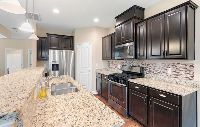 Beautiful 4BR, 2.5BA End Unit Townhome in East Raleigh - Available Now!