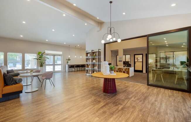 a large living room with a table and a dining room at Paisley and Pointe Apartments, Las Vegas, NV 89130