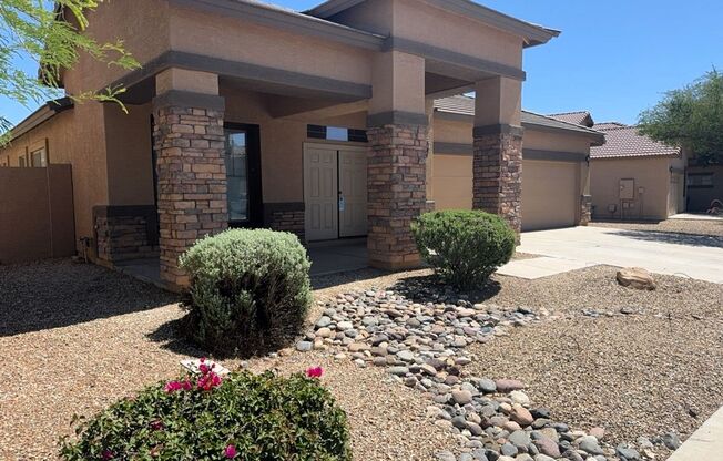 4 BEDROOM HOME IN LITCHFIELD MANOR WITH 3 CAR GARAGE