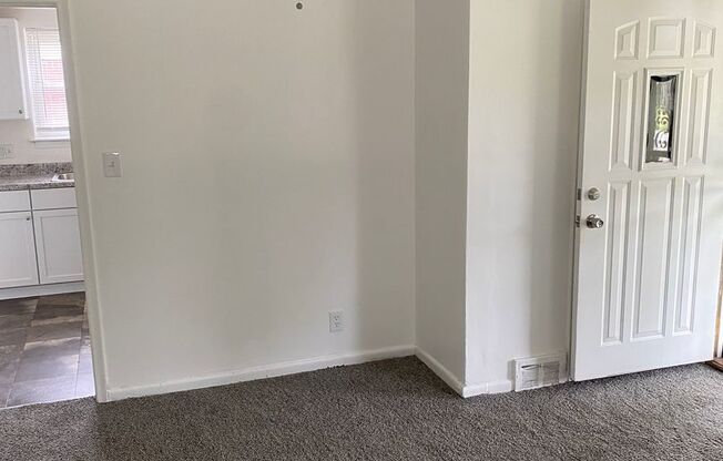 Freshly painted 3 bedroom, 1 1/2bath ranch with basement and garage