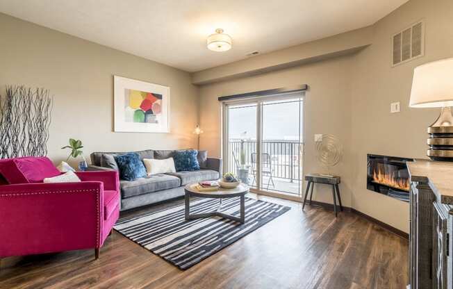 Living room with hardwood floors of one bedroom apartment for rent at 360 at Jordan West best new apartments West Des Moines IA 50266