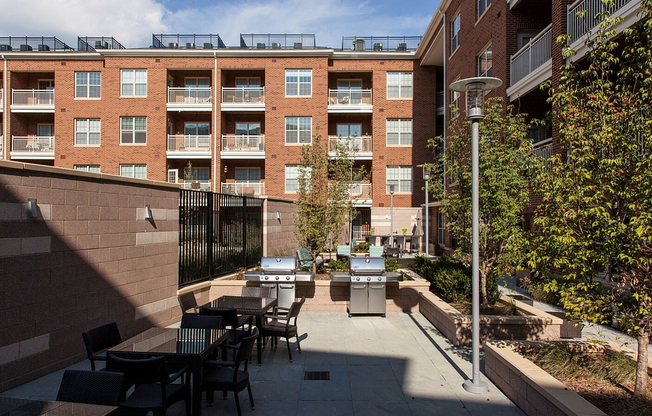 Urban Courtyard With BBQ & Seating Areas