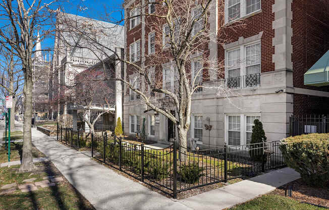 A tree-lined exterior of Pleasant Oaks at Pleasant Oak Apartments, Oak Park