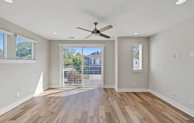 Modern 4-Story Townhome with Private Rooftop Terrace & 2-Car Garage