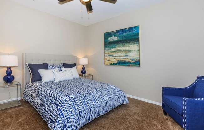 Bed and lamps with frames at Level 25 at Durango by Picerne, Las Vegas, NV