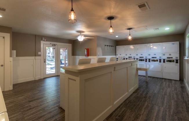 This is a photo of the community clothes care center at Preston Park Apartments in Dallas, TX