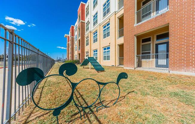 outdoor dog play area at Aspire at 610 apartments