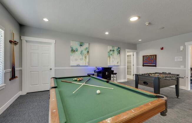Community Clubhouse with Game Tables at Landings at Morrison Apartments located in Gresham, OR.