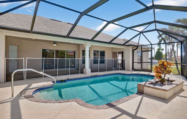 Annual unfurnished 4/2 pool home with 3 car garage in the Southwest Cape