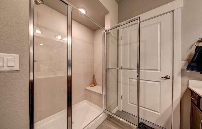 Pelican bathroom glass shower with bench