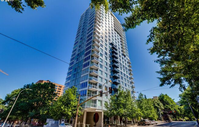 Modern 2-Bed/2-Bath Condo with Balcony, Parking & Prime Downtown Location