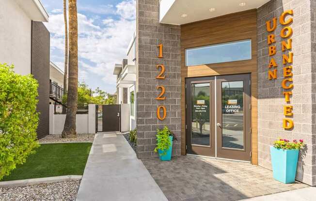 The image shows the front of a building with a sign that reads "Urban Connected".