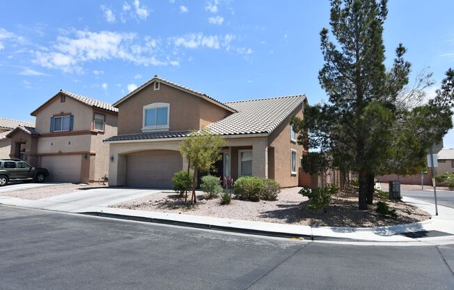 4-Bedroom Corner-Lot Home with Vaulted Ceilings and a Huge Backyard