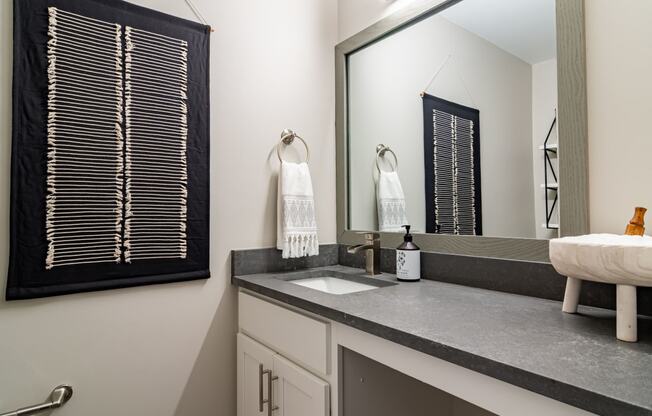 Renovated bathroom vanity at Elme Sandy Springs Apartments, Atlanta, GA, 30350