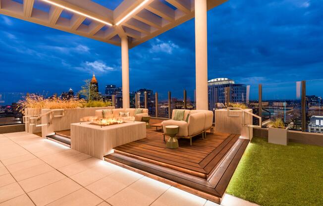 An elevated rooftop retreat at Modera Parkside in Atlanta pairs skyline views, inviting gathering space, and Midtown energy just beyond the terrace.