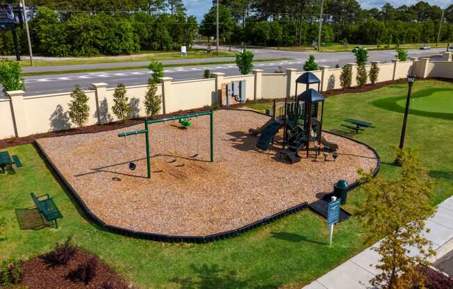 an aerial view of a playground in a park