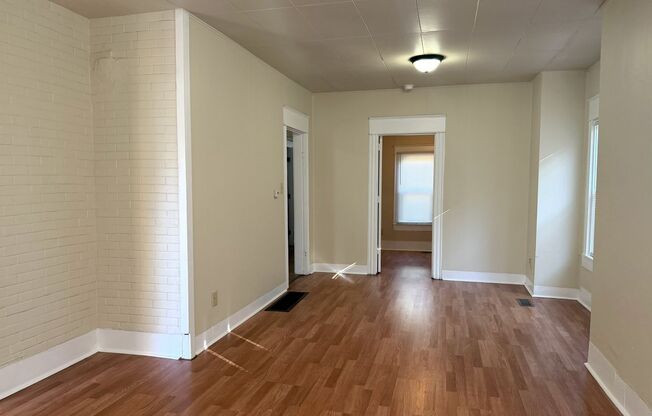 Charming 1907 house with stunning front porch and spacious back yard!