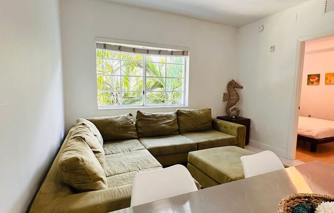 Bright and furnished 1/1 in classy remodeled Art Deco Building