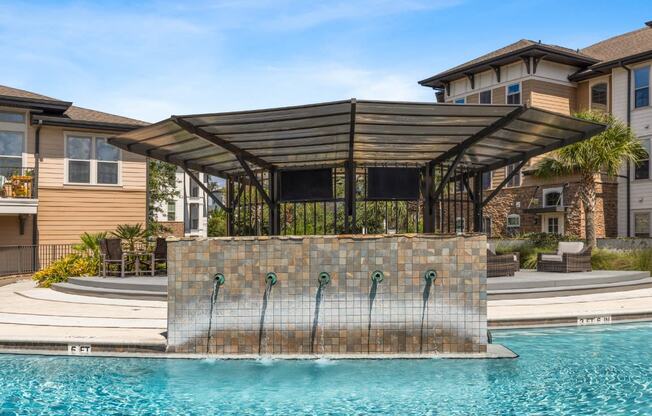 Swimming Pool with a Waterfall at The Loree, Jacksonville, FL, 32256