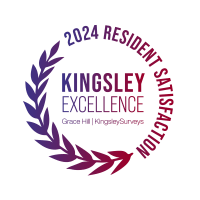 a circle with the words kingsley excellence on a green background
