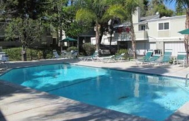 Warner Center 3+2 bedroom townhome with a private garage