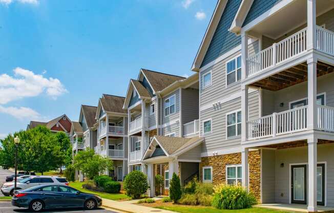 Bright Apartment Home Exteriors with Trees Inviting You Inside at Ashby at Ross Bridge, Hoover, AL