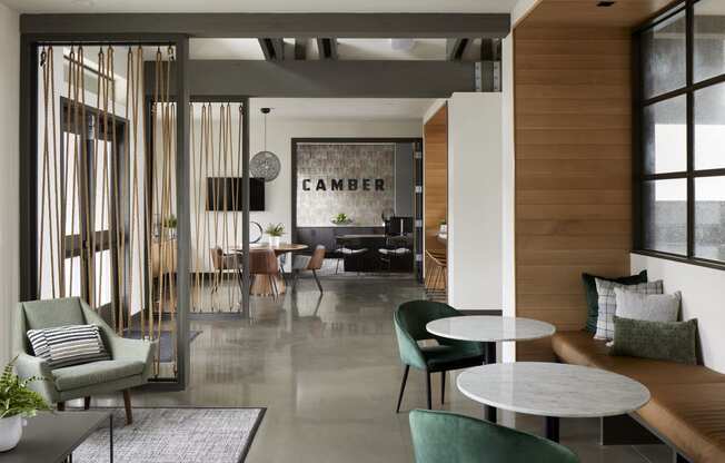 a room filled with furniture and a large window