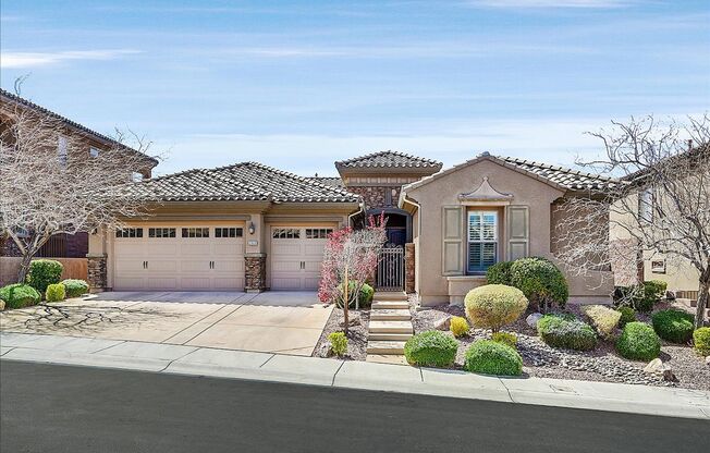 Stunning 1-story home in the prestigious Club at Madeira Canyon guard gated community!