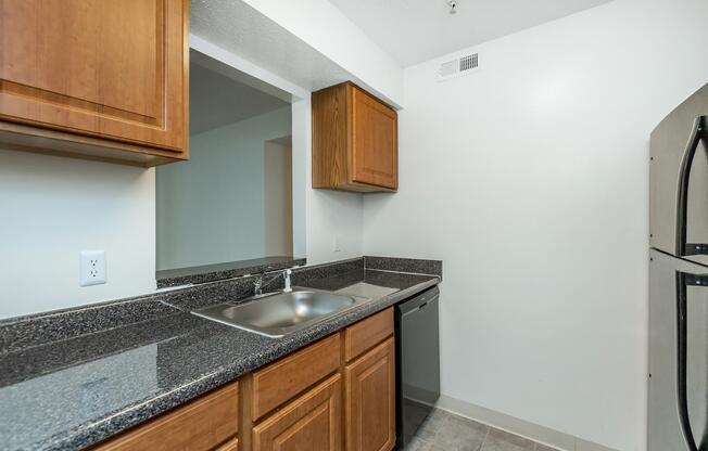 a kitchen with a stove and a sink