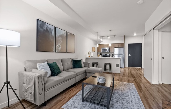 a living room with a couch and a coffee table