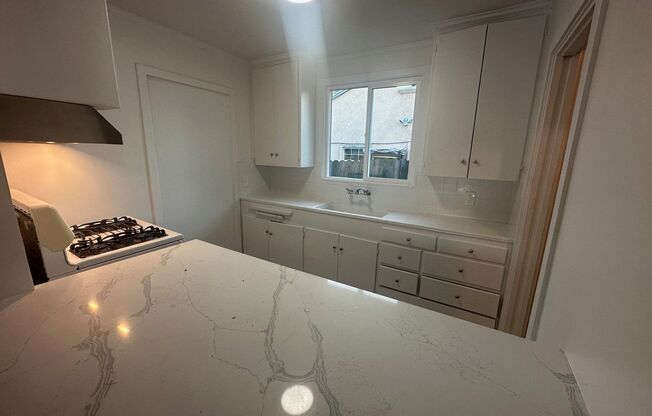 Remodeled Duplex with Quartz Kitchen Counter Tops