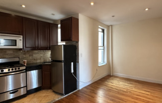 114 E 1 ST